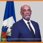 ariel henry, le pigeon voyageur, invité au 48e anniversaire de l'indépendance du suriname
