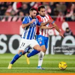 le fc girona assure contre deportivo alavés et reste leader de la liga